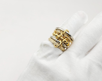 Sterlingzilveren ring met meerdere schakels, diamantaccent, gouden detail