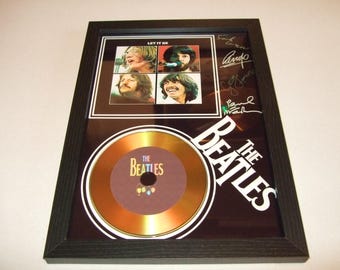 the beatles  signed  photo mount