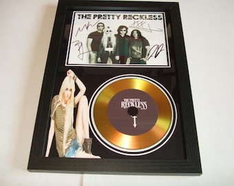 the pretty reckless   signed  photo mount