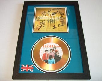 the hollies   signed  photo mount