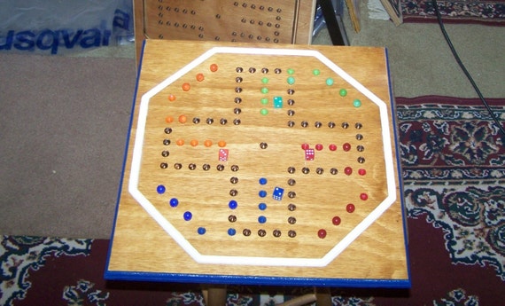 board game with marbles and dice