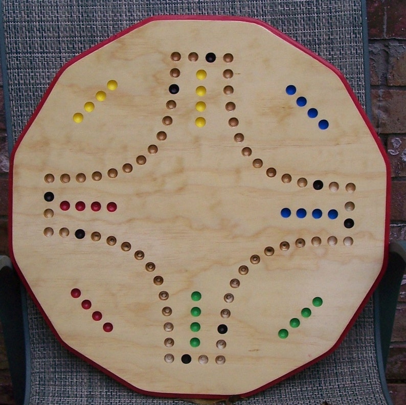 marble board game played with cards