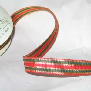 May include: Red, green, and gold striped ribbon with a gold metallic sheen. The ribbon is wound around a spool labeled "Designer Dispatch".