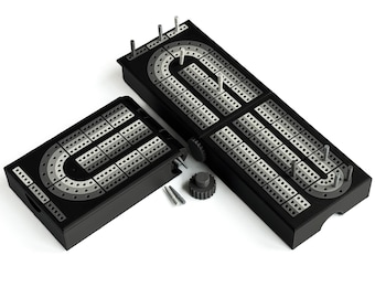 May include: Two black cribbage boards with silver and gray scoring tracks and pegs. One board is open, the other is closed. A small, round, black gear-shaped piece and two silver pegs are also included.