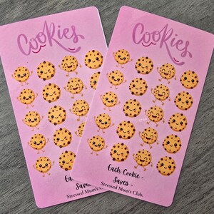 May include: Pink sheet with the word "Cookies" in a pink and white font. The sheet is covered with 25 cartoon cookies with chocolate chips and smiling faces. The text "Each Cookie - Saves - Stressed Mum's Club." is at the bottom of the sheet.