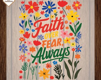May include: A colorful floral design with the text "Faith over fear, always". The design features a variety of flowers in shades of red, yellow, blue, and pink.