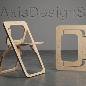 May include: A light-colored wooden folding chair and a matching flat panel. The chair is in an open position, with a seat and backrest. The panel has a large cutout. The text "AxisDesignStu" is visible in the background.