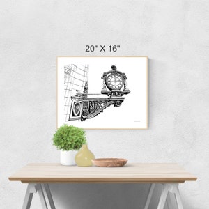 Puede incluir: Dibujo en blanco y negro de una esfera de reloj adornada en un edificio, enmarcado en un marco blanco con un passe-partout blanco. La imagen mide 50,8 cm por 40,6 cm.
