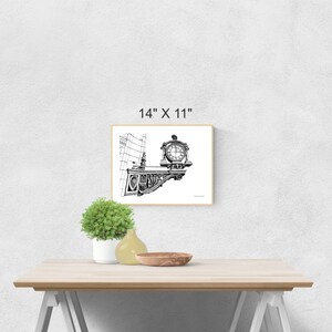 Puede incluir: Dibujo en blanco y negro de una esfera de reloj en una fachada de edificio. El reloj está enmarcado con un paspartú blanco y un marco de madera. La imagen mide 14 pulgadas por 11 pulgadas.