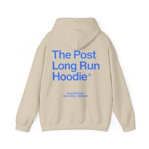 May include: A beige hoodie with the text "The Post Long Run Hoodie" in blue on the back. Below the text are the words "Run Strong. Rest Well. Repeat."