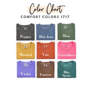 May include: Color chart showing nine different colors of t-shirts, labeled "Pepper", "Blue Jean", "Moss", "Mustard", "Yam", "Crunchberry", "Violet", "Espresso", and "Blue Spruce".