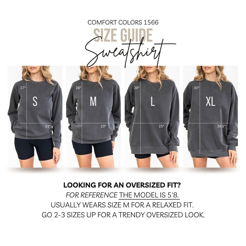 May include: Size guide for a Comfort Colors 1566 sweatshirt. The image shows four models wearing the sweatshirt in sizes S, M, L, and XL. The text on the image reads "Looking for an oversized fit?" and provides sizing guidance.