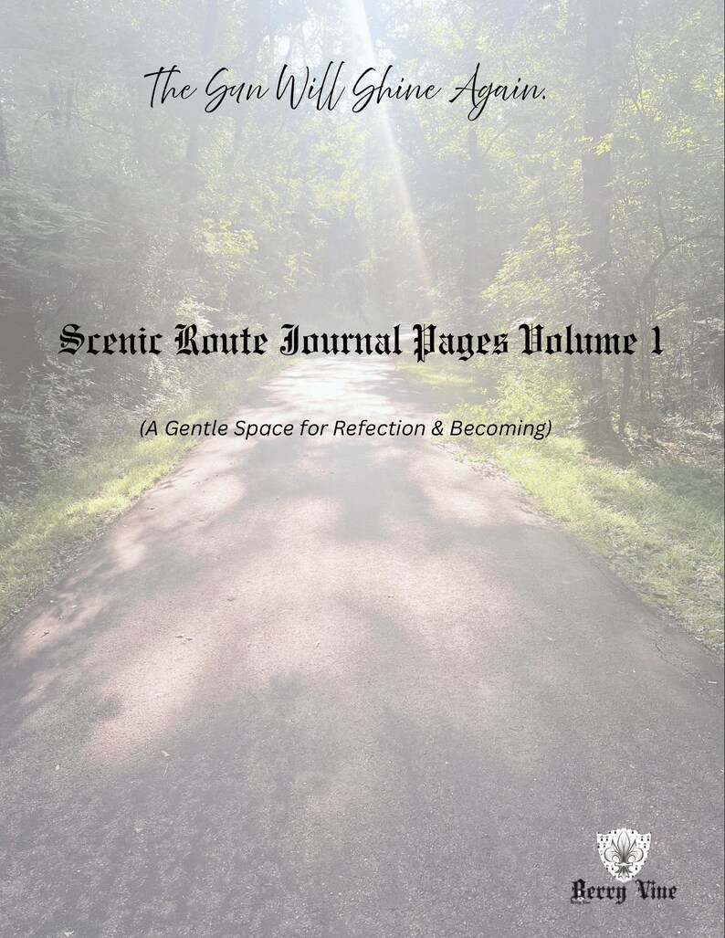 May include: A journal cover with a scenic road leading into a sunlit forest. The text "The Sun Will Shine Again" is at the top, with "Scenic Route Journal Pages Volume 1" below. The journal is from Berry Vine.
