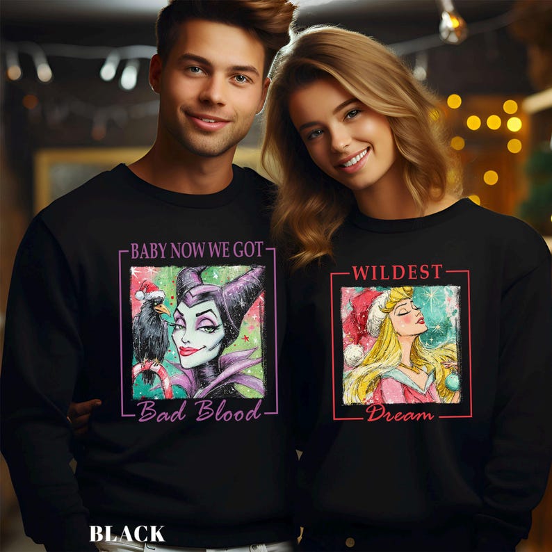 Puede incluir: Sudaderas negras con gr&aacute;ficos a juego. Una presenta a Mal&eacute;fica con un cuervo y el texto "Baby Now We Got - Bad Blood". La otra muestra a Aurora con el texto "Wildest Dream".