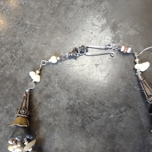 Multistrand stone and pearl necklace