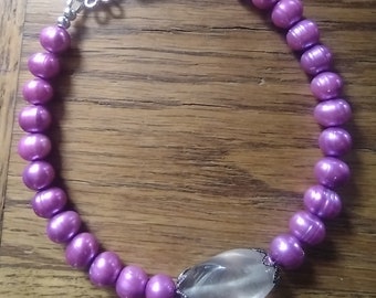 Purple pearl and fluorite 8.5 inch long bracelet