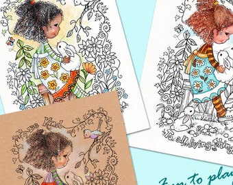 May include: Two coloring pages featuring a girl with a bunny. The girl on the left has brown skin and brown hair. The girl on the right has light skin and red hair. Both girls are wearing floral dresses and are surrounded by flowers and vines. The text on the pages reads "Be Kind to all living things."