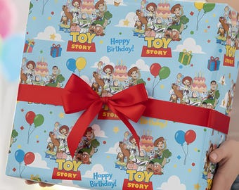 May include: A wrapped gift featuring a light blue Toy Story-themed wrapping paper with character illustrations, balloons, and birthday cakes. The paper is tied with a red ribbon and bow, with the words "Happy Birthday!" and "Toy Story" visible.