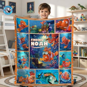 May include: A colorful blanket featuring characters from the animated film "Finding Nemo." The design includes images of Nemo, Dory, and other sea creatures in a vibrant underwater scene. The blanket has an orange border and the text "Finding Noah."