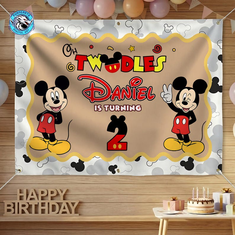 May include: A rectangular party banner featuring a tan center with a scalloped gold border, displaying the text "Oh Twodles Daniel Is Turning 2" alongside two illustrations of Mickey Mouse. The background has a white and gray Mickey head pattern.