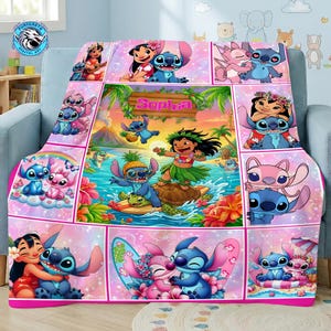 May include: A pink and white throw blanket featuring a collage of images with the characters Lilo and Stitch. The blanket has a tropical theme with images of the characters on a beach, and the name "Sophia" is displayed on a wooden sign.