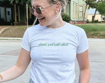 St. Patrick's Drinks Well With Others Aesthetic Coquette Irish Baby Tee, Lucky Girl Trendy T-shirt for Women St Paddys Irish Shirt