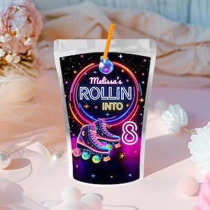 May include: A clear plastic pouch with a colorful design featuring roller skates, stars, and the text "Melissa's Rollin' Into 8". The design includes neon colors and a disco ball. An orange straw is inserted into the pouch.