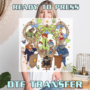 May include: White t-shirt with a colorful DTF transfer featuring cartoon characters in a decorative frame. The words "READY TO PRESS" and "DTF TRANSFER" are printed in a light blue font.