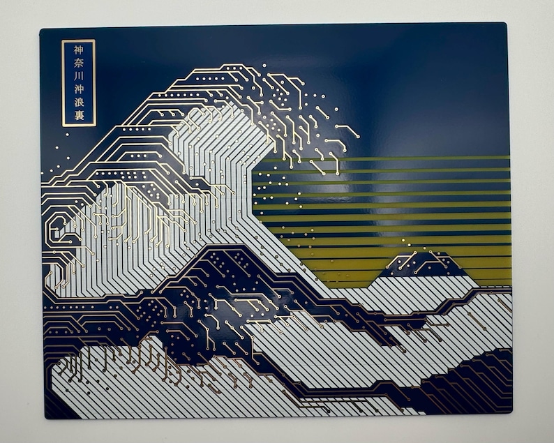 May include: A blue and white digital art print of a wave with a circuit board design. The print has a gold accent and the text "神奈川沖浪裏" in Japanese.