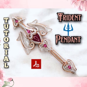 May include: A handcrafted trident pendant made from copper and silver wire, with a central maroon stone and smaller pink stones. The image includes the words "TUTORIAL" and "TRIDENT PENDANT". The pendant is designed with intricate wirework and decorative elements.