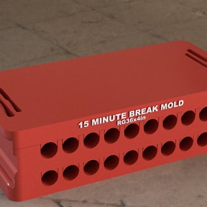 May include: Red plastic mold with 15 round cavities. The mold is labeled "15 MINUTE BREAK MOLD RG36x4in".