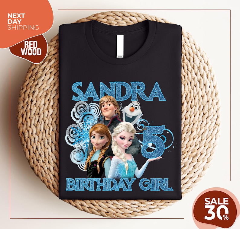 a black tshirt with a picture of two frozen princesses on it