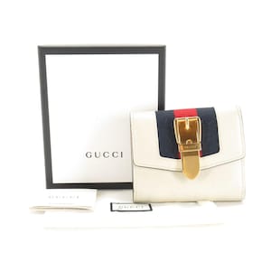Cartera mediana Sherry de piel color marfil de Gucci