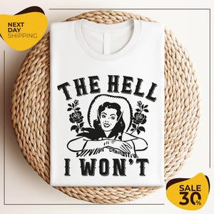 a white t - shirt with the words the hell i won't on it