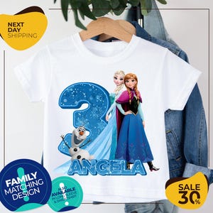 a t - shirt with a picture of two frozen princesses on it