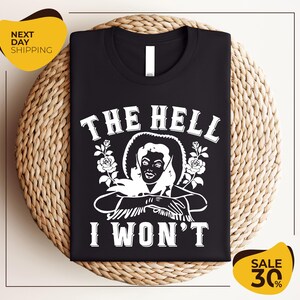 a black t - shirt with the words the hell i won't on it