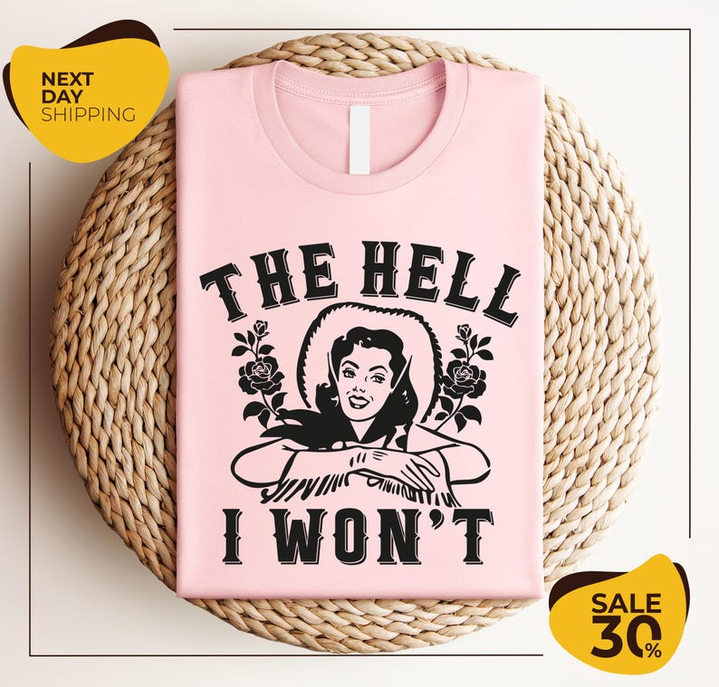 a pink t - shirt that says the hell i won't
