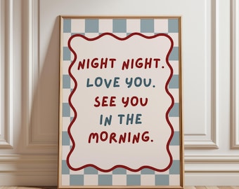 May include: A framed print with the words "NIGHT NIGHT. LOVE YOU. SEE YOU IN THE MORNING." in red and blue text. The text is inside a white, wavy-edged shape, set against a light beige background with a blue and white checkered pattern.