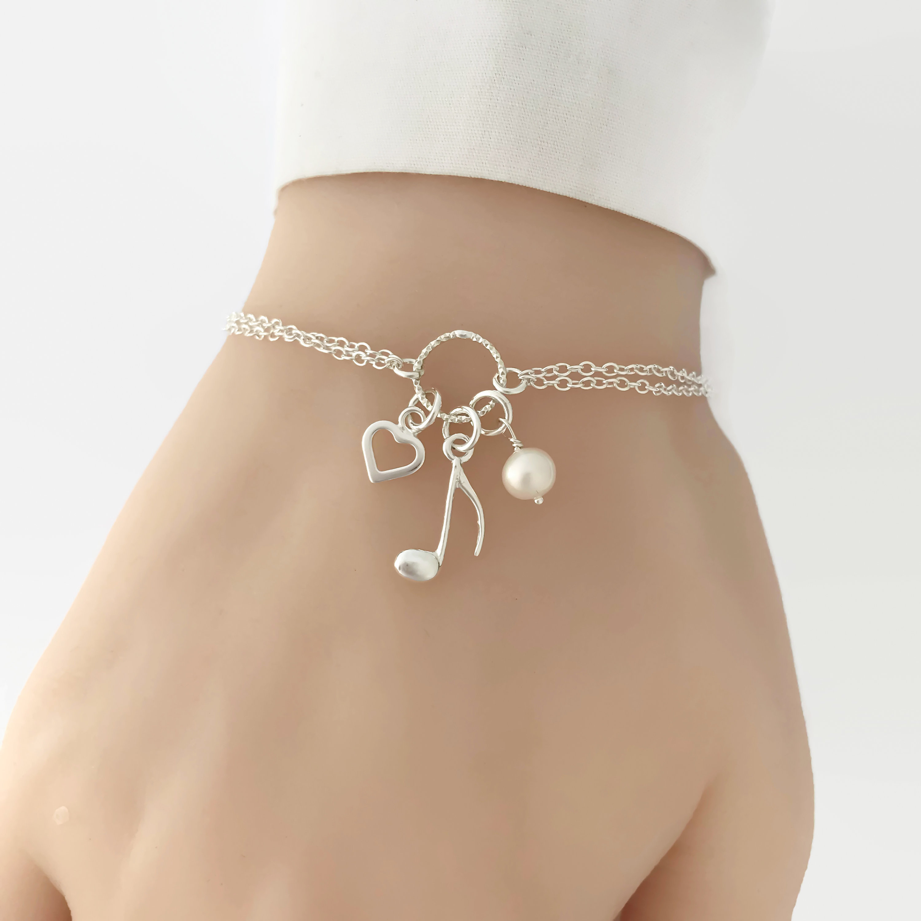 Face the Metallic Music Silver Bracelet – Ericka C Wise, $5 Jewelry