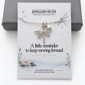 May include: A sterling silver dragonfly pendant necklace with a small white pearl accent on a display card featuring the text JEWELLERY BY ZM and A little reminder to keep moving forward for brighter days and new adventures.
