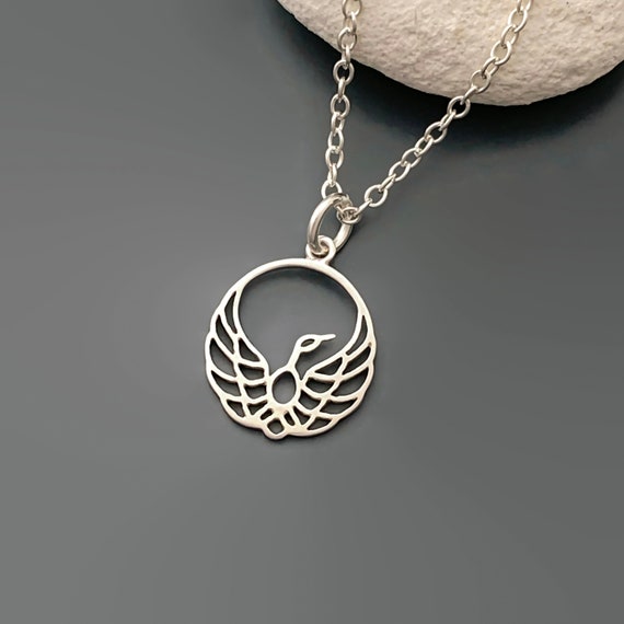 STERLING SILVER PHOENIX VALLEY OF THE SUN CHARM WITH THIN SINGAPORE NECKLACE STERLING SILVER PHOENIX VALLEY OF THE SUN CHARM WITH THIN SINGAPORE NECKLACE