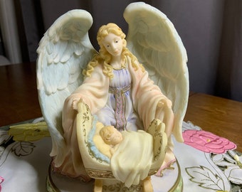 Vintage Roman Inc Angel with child in crib - 1999 Angel with child numbered #46286 - Guardian Angel Watching over Sleeping Baby