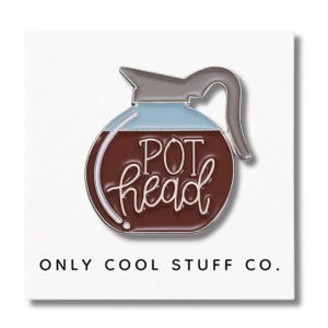 May include: A brown and silver enamel pin shaped like a coffee pot with the text "POT head" in white lettering. The pin is on a white background with the text "ONLY COOL STUFF CO." below the pin.
