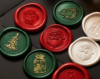 May include: Eight round wax seals with different Christmas designs. The seals are red, green, and white with gold accents. The designs include a Christmas tree, Santa Claus, a gift box, and a wreath.