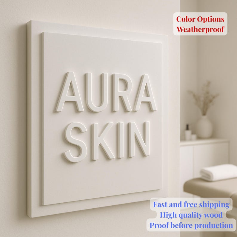 May include: A white rectangular sign with the words "AURA SKIN" in raised, white lettering. The sign is mounted on a wall. Text in the upper right corner reads "Color Options Weatherproof". Additional text at the bottom reads "Fast and free shipping High quality wood Proof before production".