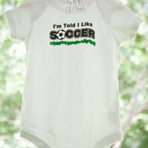 I'm Told I Like Soccer Silhouette Baby Bodysuit Boys & Girls Trendy Gift for Newborn and Birthday Gender Neutral, Sports, Outdoors image 3