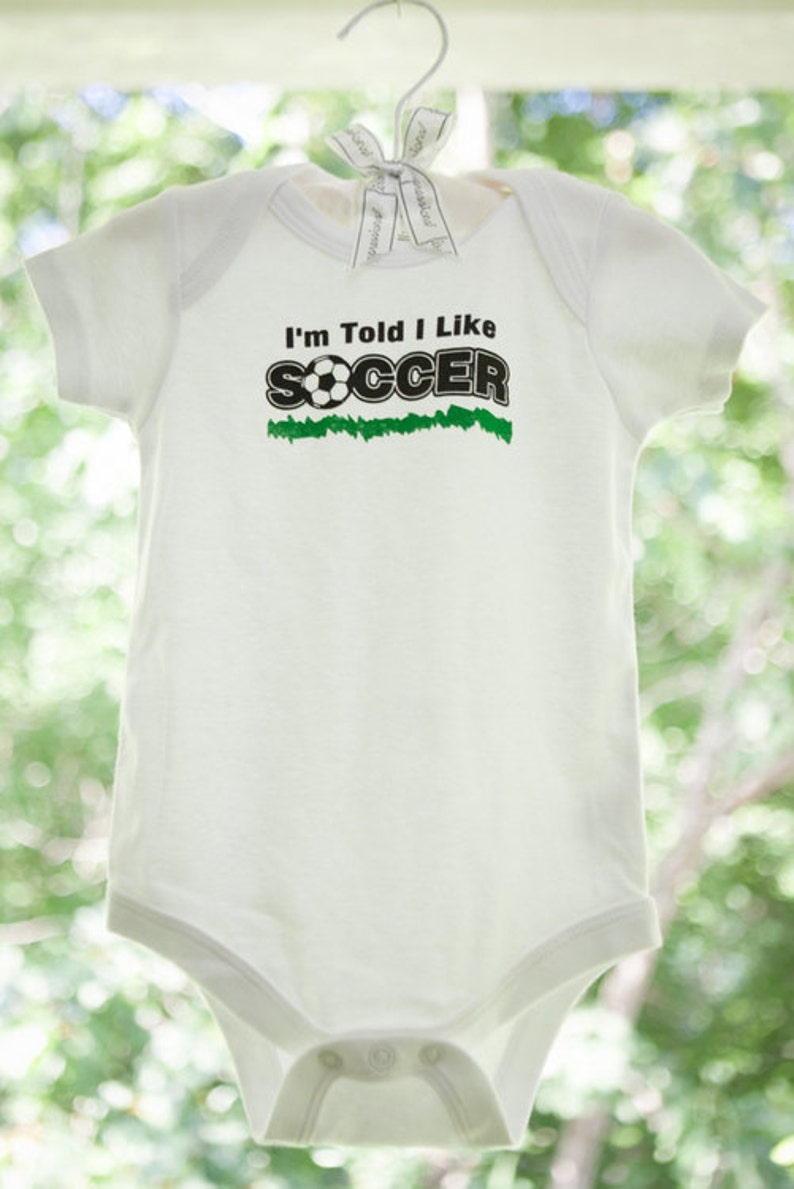 I'm Told I Like Soccer Silhouette Baby Bodysuit Boys & Girls Trendy Gift for Newborn and Birthday Gender Neutral, Sports, Outdoors image 3