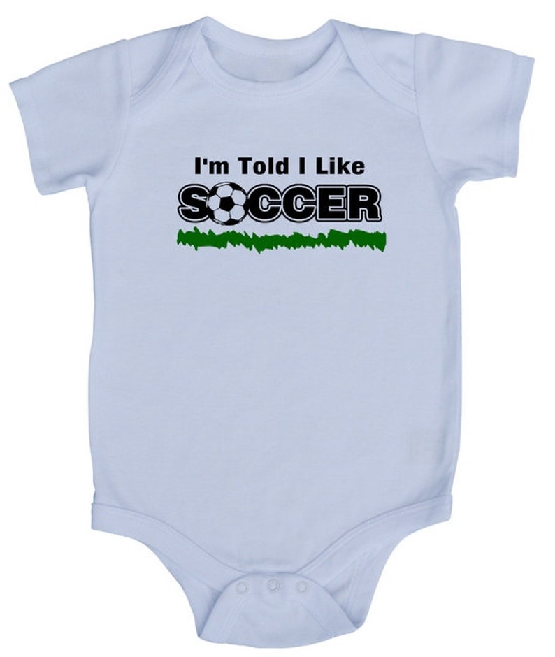 I'm Told I Like Soccer Silhouette Baby Bodysuit Boys & Girls Trendy Gift for Newborn and Birthday Gender Neutral, Sports, Outdoors image 1