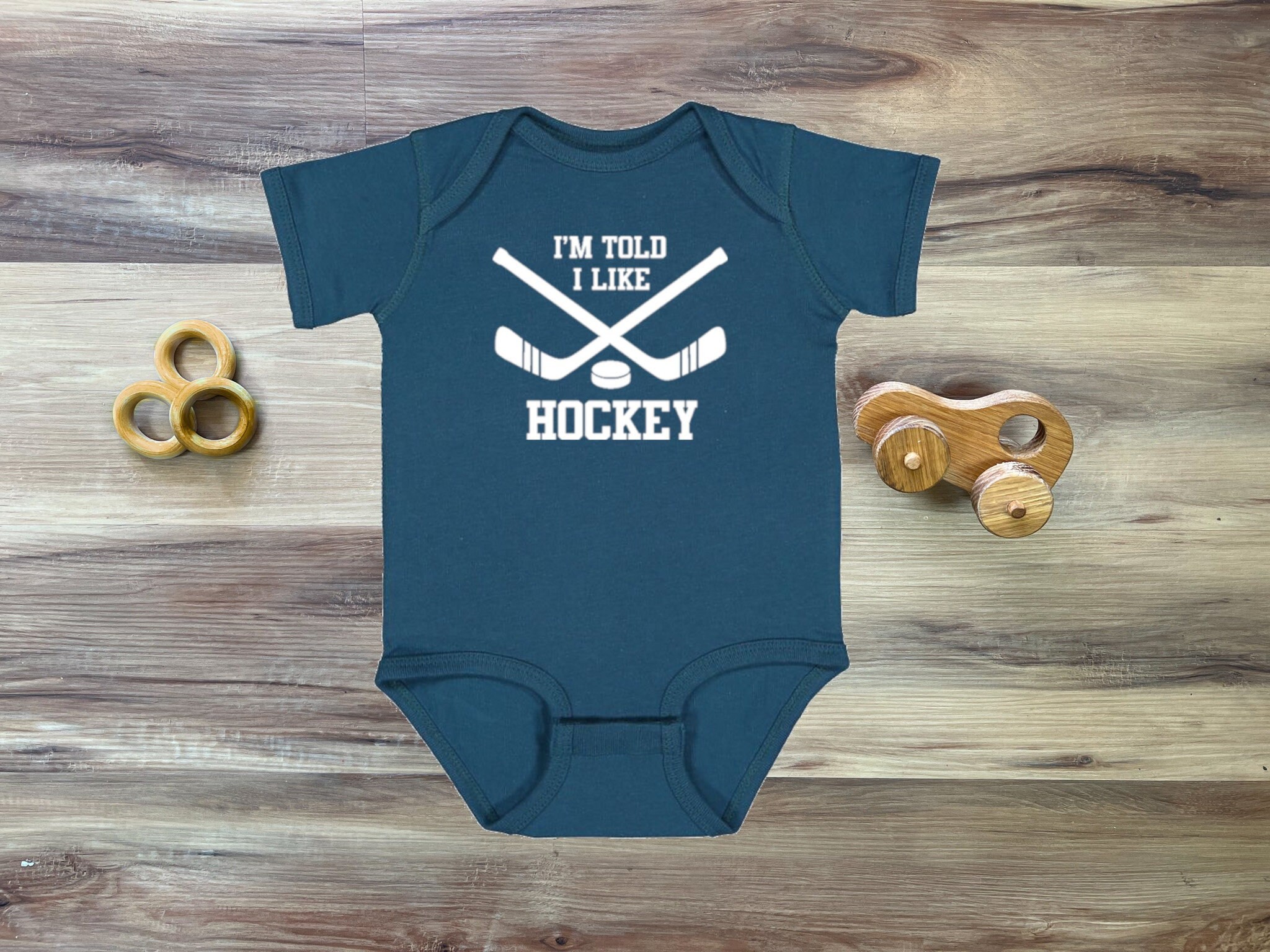 I'm Told I Like Hockey Silhouette Baby Bodysuit Boys Girls