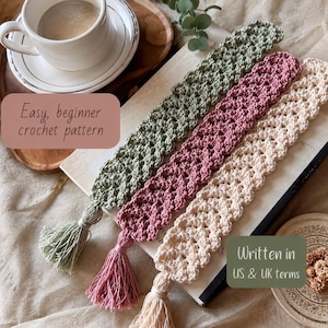 May include: Three rectangular crochet bookmarks in sage green, dusty rose, and cream, each featuring a textured stitch pattern and a matching tassel at the bottom. The text on the image reads: Easy, beginner crochet pattern and Written in US & UK terms.